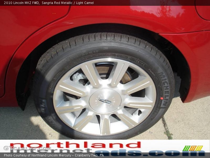 Sangria Red Metallic / Light Camel 2010 Lincoln MKZ FWD