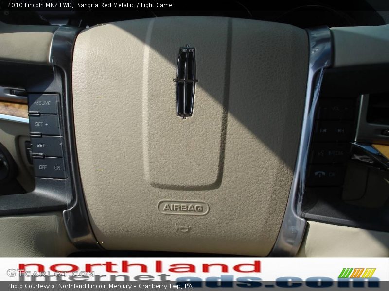 Sangria Red Metallic / Light Camel 2010 Lincoln MKZ FWD