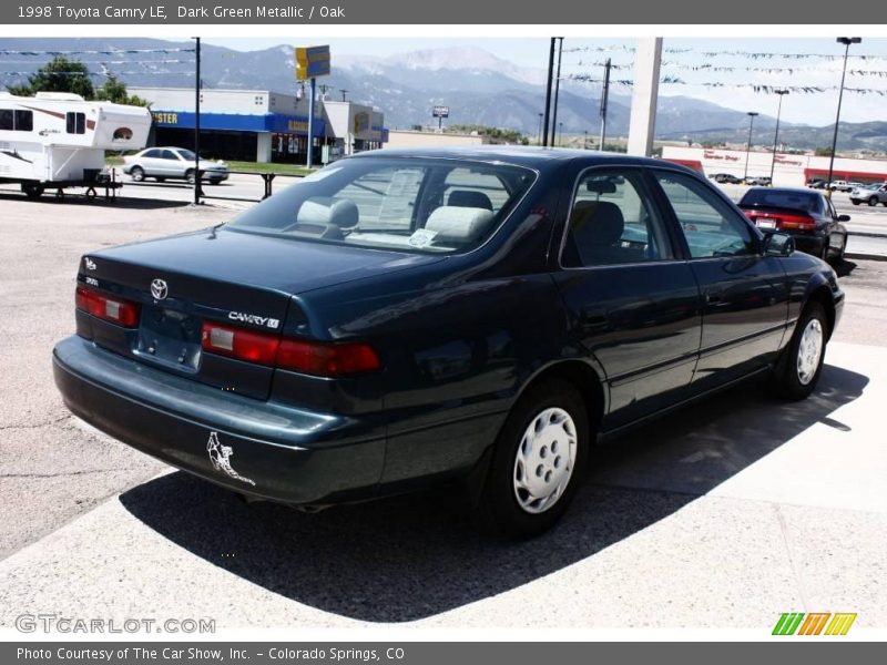 Dark Green Metallic / Oak 1998 Toyota Camry LE