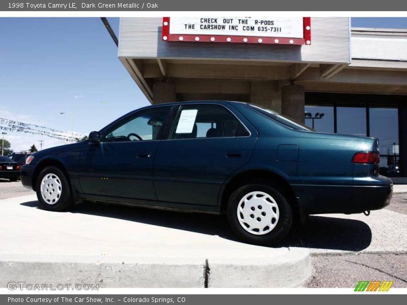 Dark Green Metallic / Oak 1998 Toyota Camry LE
