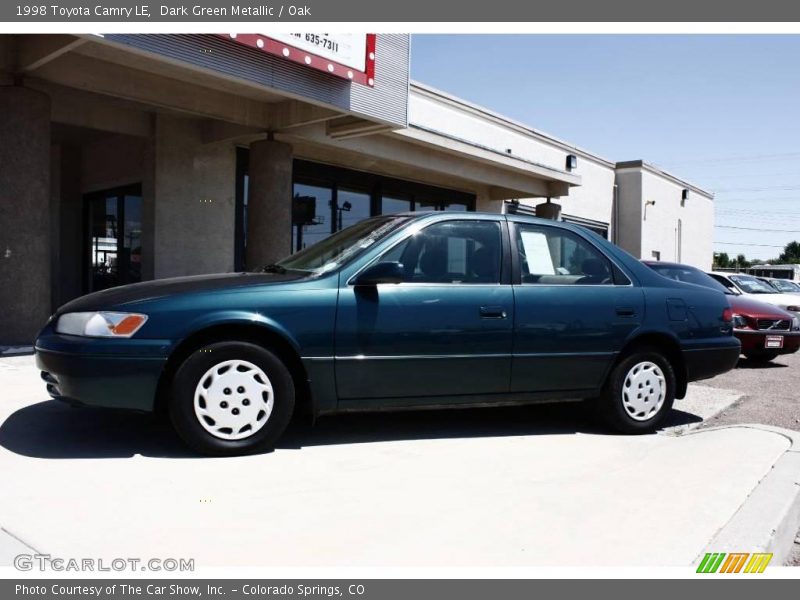 Dark Green Metallic / Oak 1998 Toyota Camry LE