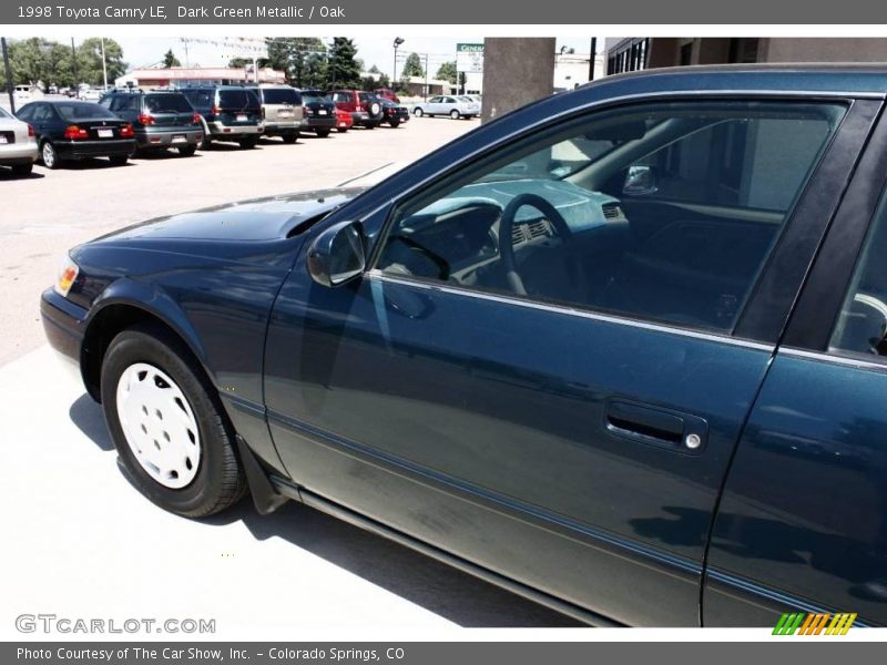 Dark Green Metallic / Oak 1998 Toyota Camry LE