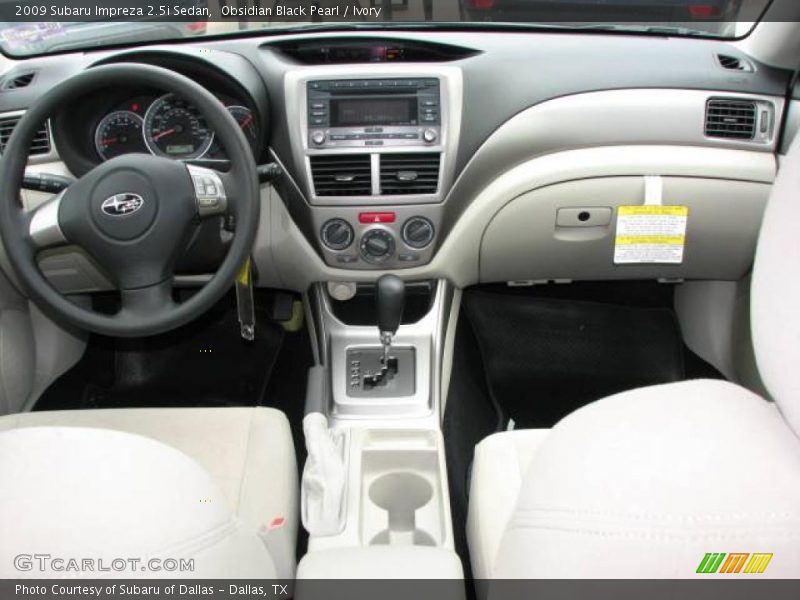 Obsidian Black Pearl / Ivory 2009 Subaru Impreza 2.5i Sedan