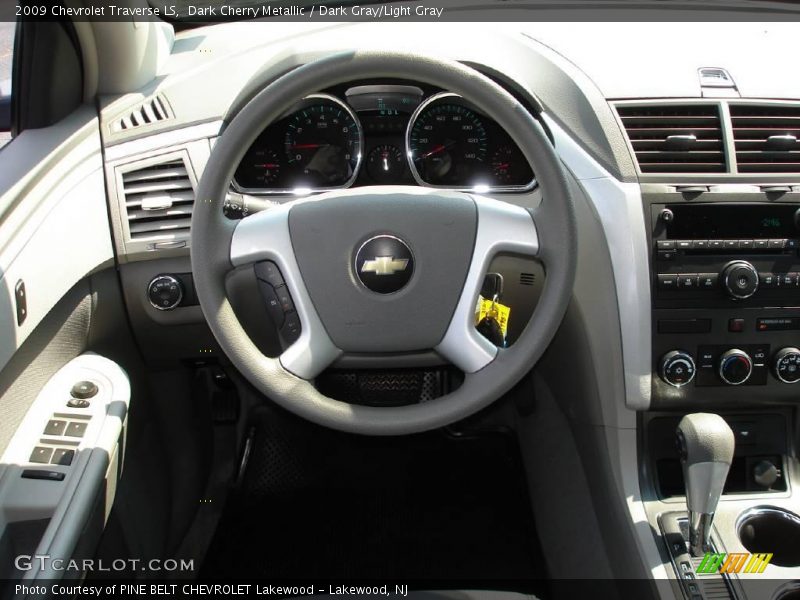 Dark Cherry Metallic / Dark Gray/Light Gray 2009 Chevrolet Traverse LS