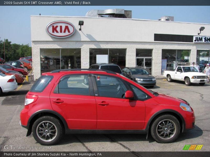 Vivid Red / Black 2009 Suzuki SX4 SWT Crossover AWD