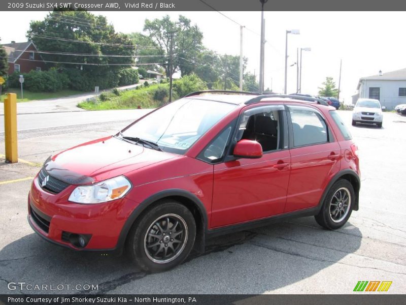 Vivid Red / Black 2009 Suzuki SX4 SWT Crossover AWD