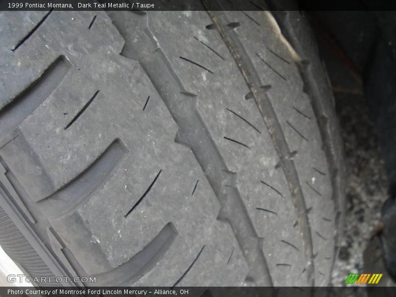Dark Teal Metallic / Taupe 1999 Pontiac Montana
