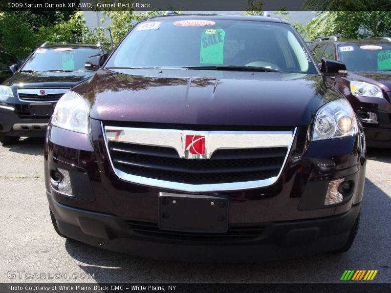 Garnet Red / Black 2009 Saturn Outlook XR AWD