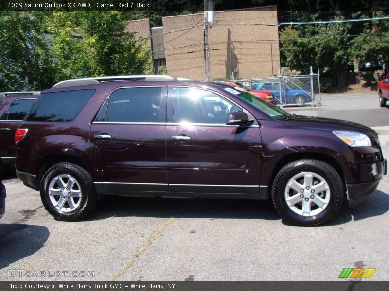 Garnet Red / Black 2009 Saturn Outlook XR AWD