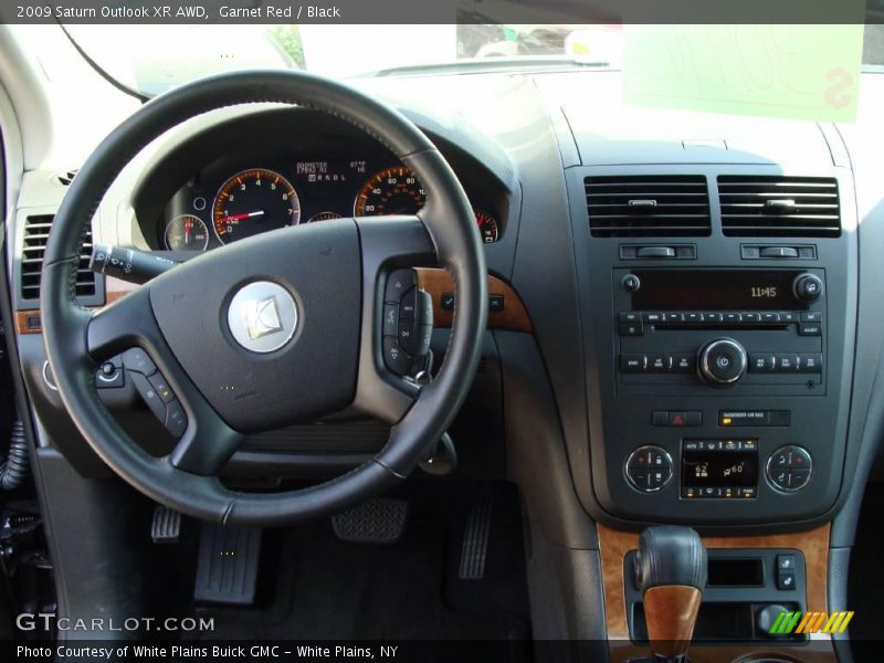 Garnet Red / Black 2009 Saturn Outlook XR AWD