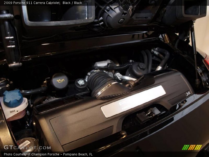 Black / Black 2009 Porsche 911 Carrera Cabriolet
