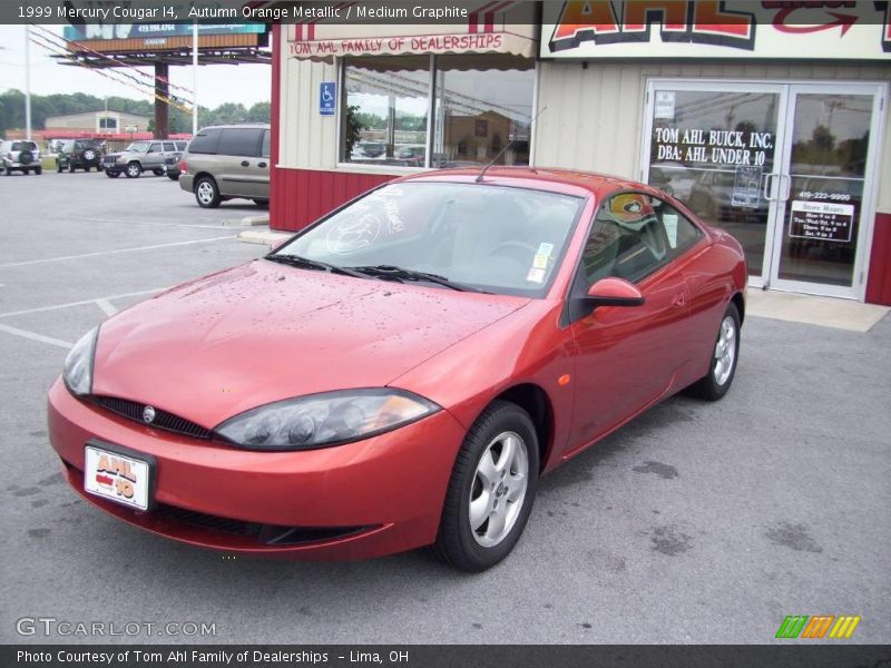 Autumn Orange Metallic / Medium Graphite 1999 Mercury Cougar I4