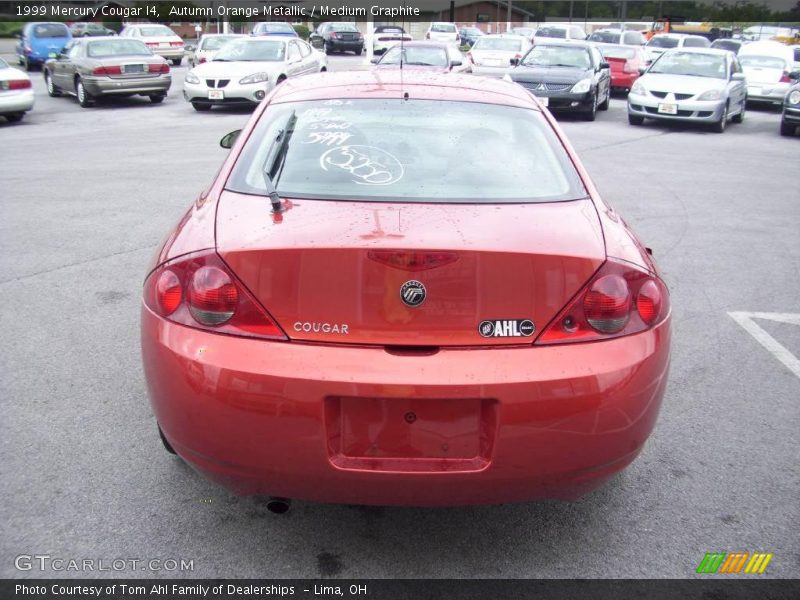 Autumn Orange Metallic / Medium Graphite 1999 Mercury Cougar I4