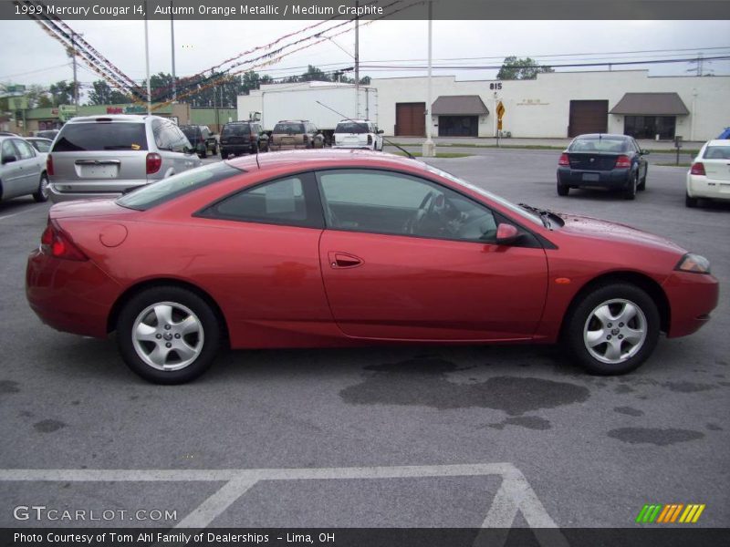 Autumn Orange Metallic / Medium Graphite 1999 Mercury Cougar I4