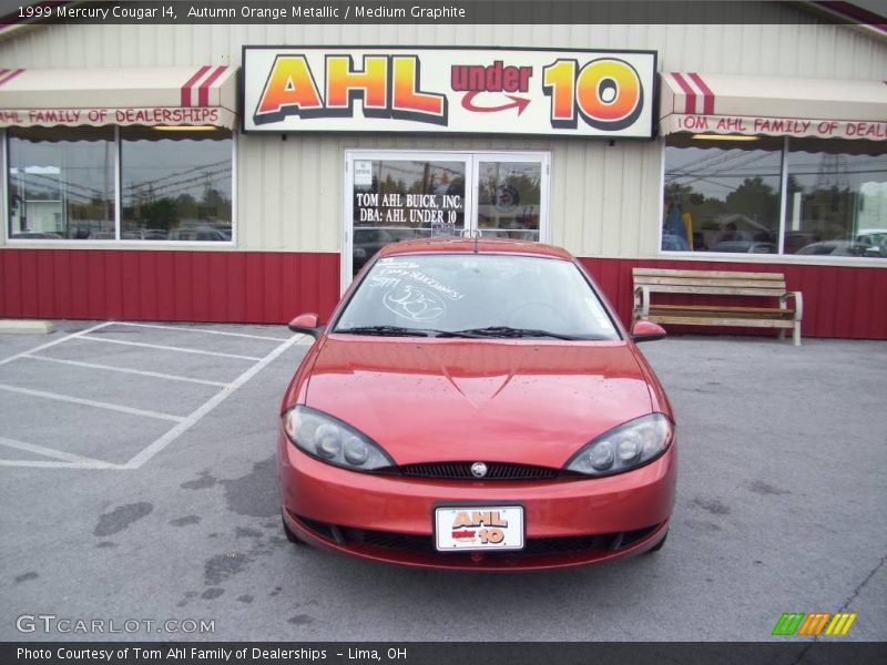 Autumn Orange Metallic / Medium Graphite 1999 Mercury Cougar I4