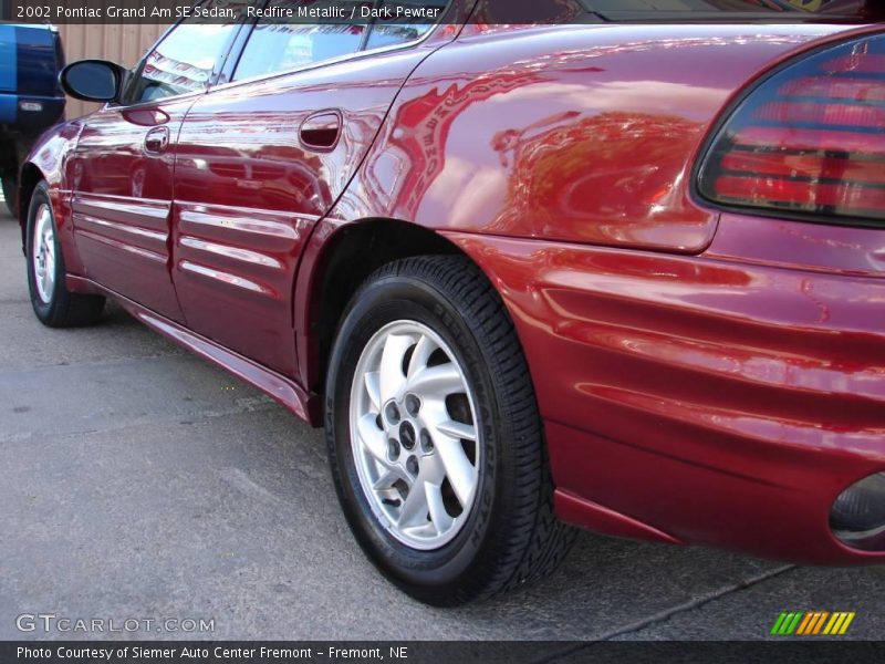 Redfire Metallic / Dark Pewter 2002 Pontiac Grand Am SE Sedan