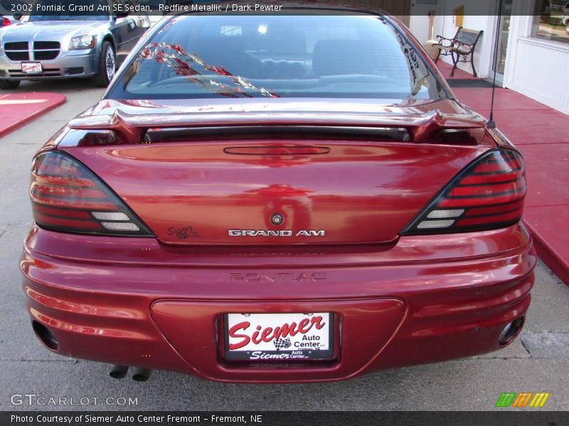 Redfire Metallic / Dark Pewter 2002 Pontiac Grand Am SE Sedan