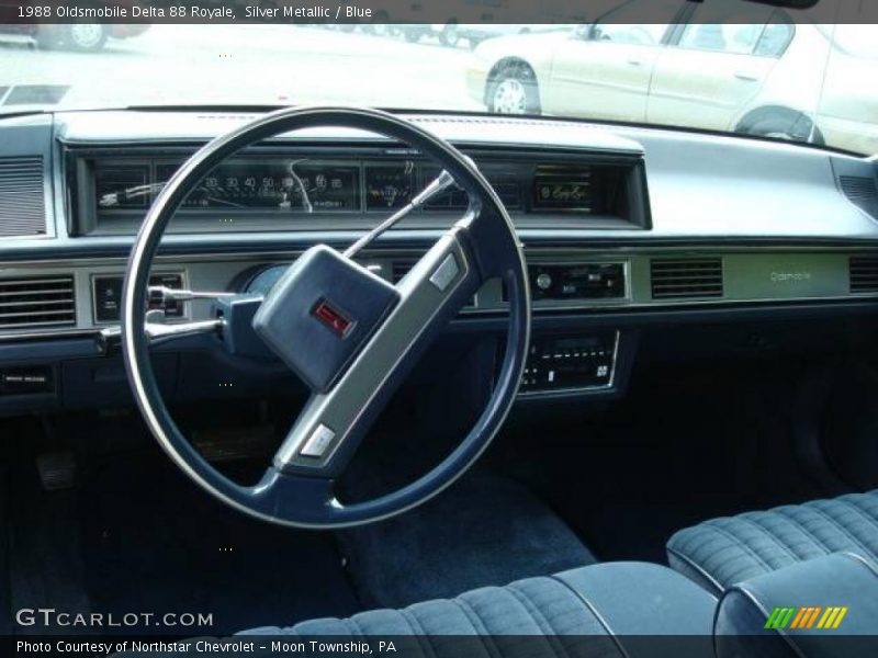 Silver Metallic / Blue 1988 Oldsmobile Delta 88 Royale