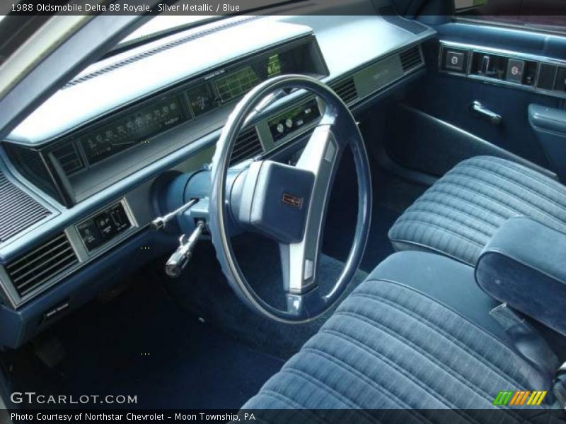 Silver Metallic / Blue 1988 Oldsmobile Delta 88 Royale