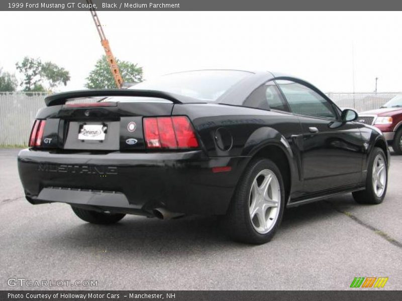 Black / Medium Parchment 1999 Ford Mustang GT Coupe