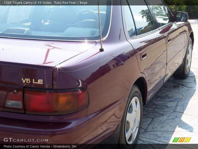 Ruby Red Pearl / Beige 1996 Toyota Camry LE V6 Sedan