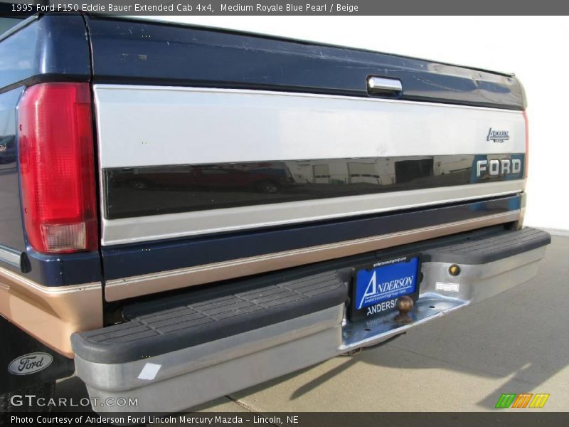 Medium Royale Blue Pearl / Beige 1995 Ford F150 Eddie Bauer Extended Cab 4x4