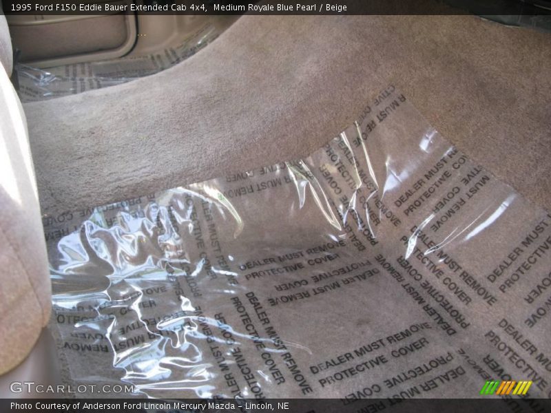 Medium Royale Blue Pearl / Beige 1995 Ford F150 Eddie Bauer Extended Cab 4x4