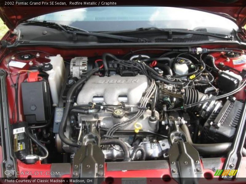 Redfire Metallic / Graphite 2002 Pontiac Grand Prix SE Sedan