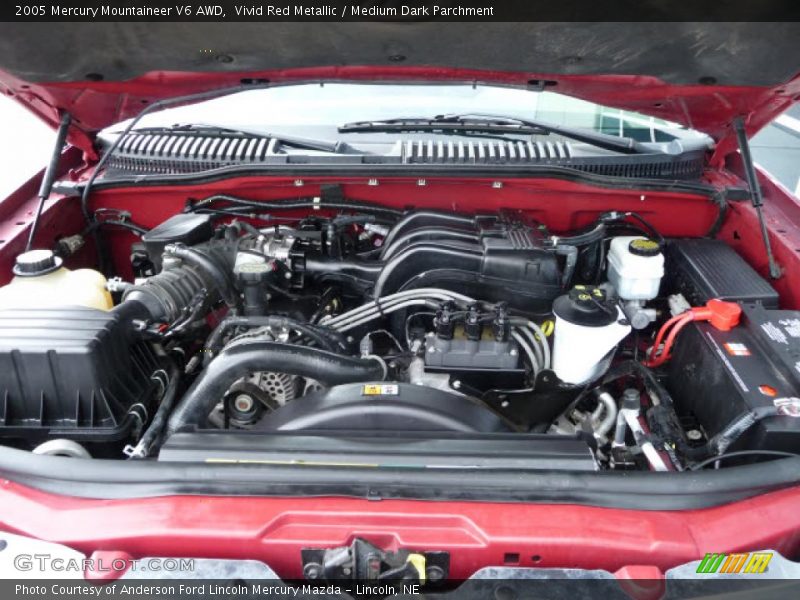 Vivid Red Metallic / Medium Dark Parchment 2005 Mercury Mountaineer V6 AWD