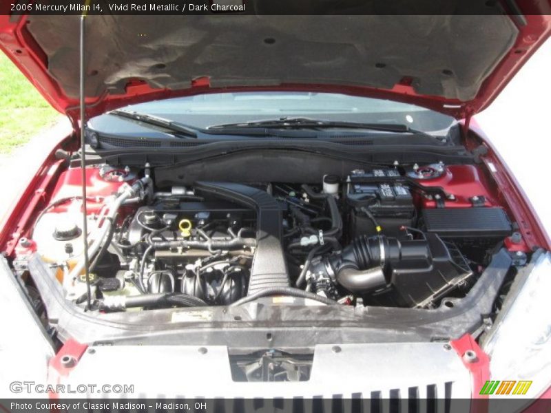 Vivid Red Metallic / Dark Charcoal 2006 Mercury Milan I4