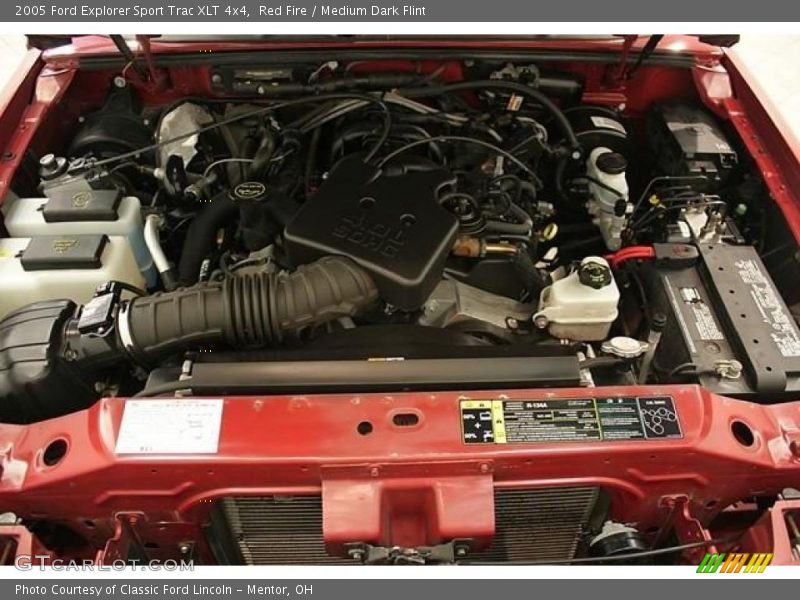 Red Fire / Medium Dark Flint 2005 Ford Explorer Sport Trac XLT 4x4