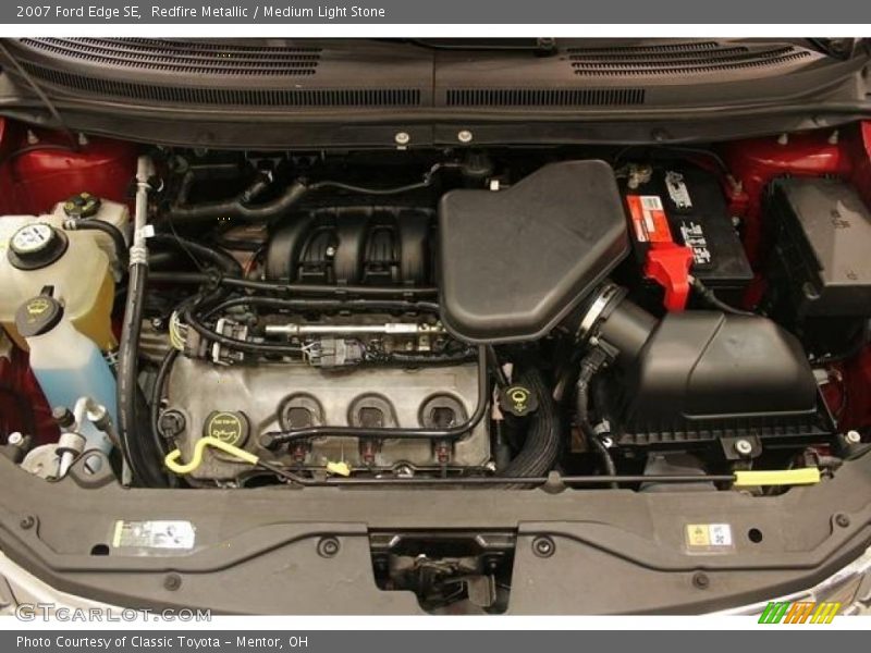 Redfire Metallic / Medium Light Stone 2007 Ford Edge SE