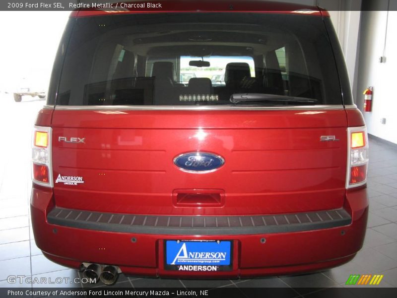 Redfire Metallic / Charcoal Black 2009 Ford Flex SEL