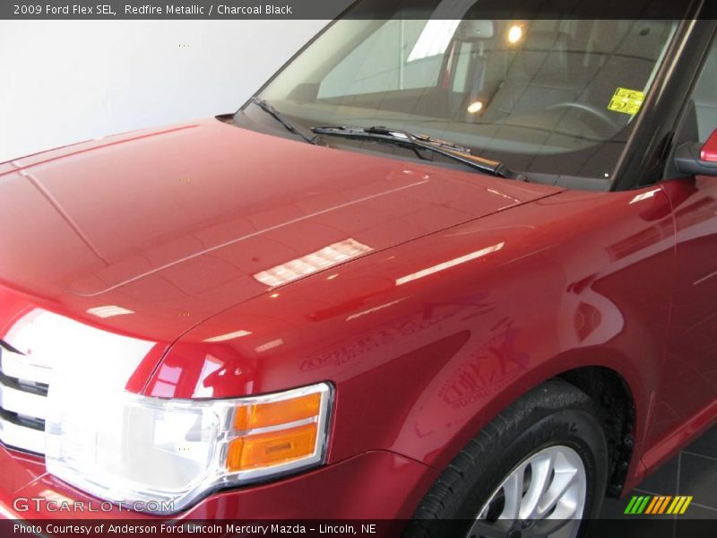 Redfire Metallic / Charcoal Black 2009 Ford Flex SEL