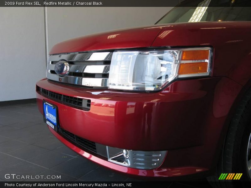 Redfire Metallic / Charcoal Black 2009 Ford Flex SEL