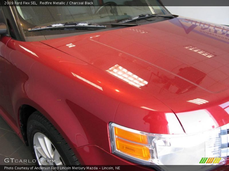 Redfire Metallic / Charcoal Black 2009 Ford Flex SEL