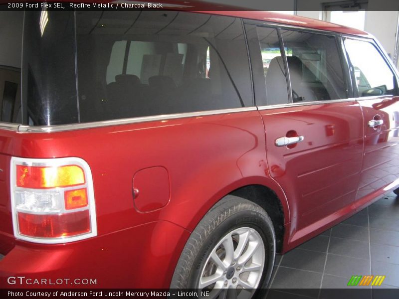 Redfire Metallic / Charcoal Black 2009 Ford Flex SEL