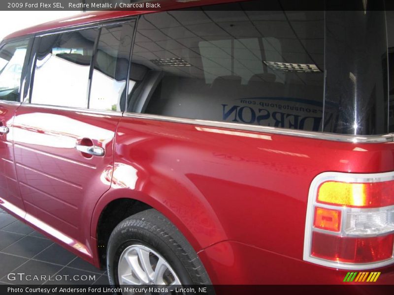 Redfire Metallic / Charcoal Black 2009 Ford Flex SEL