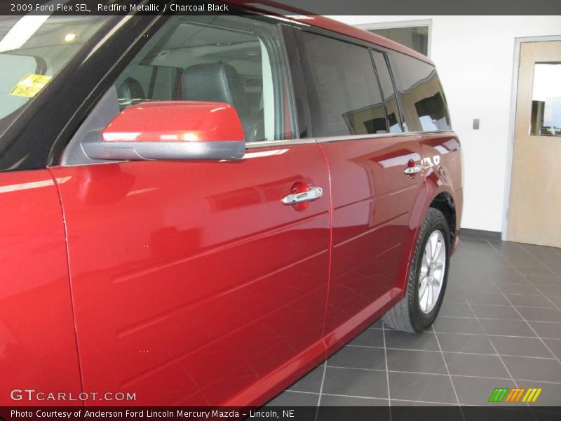Redfire Metallic / Charcoal Black 2009 Ford Flex SEL