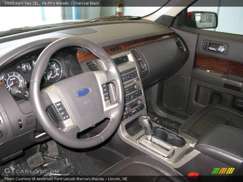 Redfire Metallic / Charcoal Black 2009 Ford Flex SEL