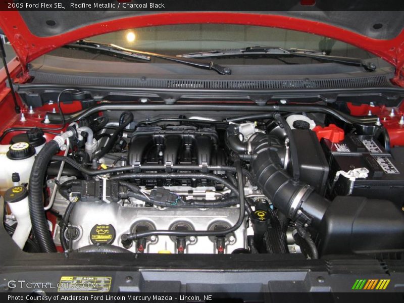 Redfire Metallic / Charcoal Black 2009 Ford Flex SEL
