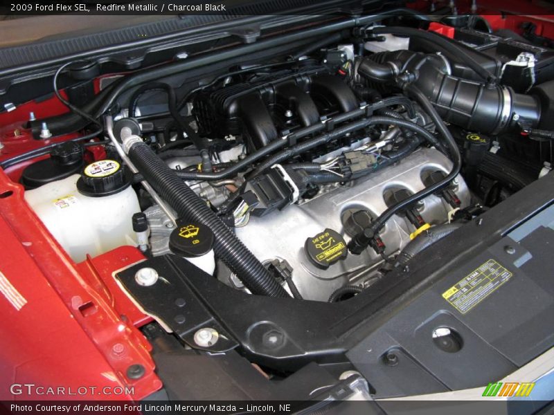 Redfire Metallic / Charcoal Black 2009 Ford Flex SEL