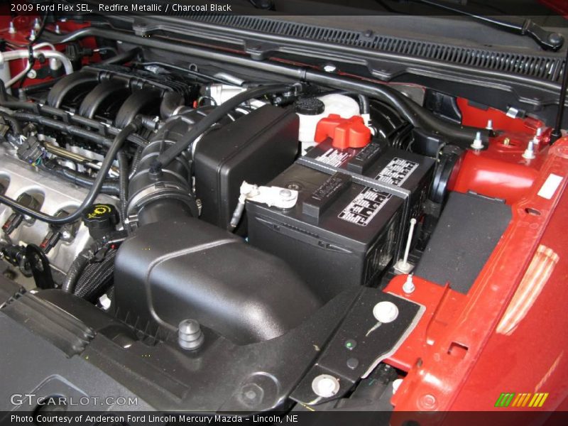Redfire Metallic / Charcoal Black 2009 Ford Flex SEL