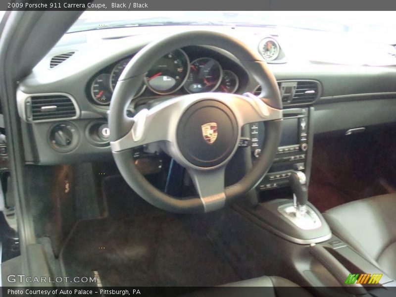 Black / Black 2009 Porsche 911 Carrera Coupe