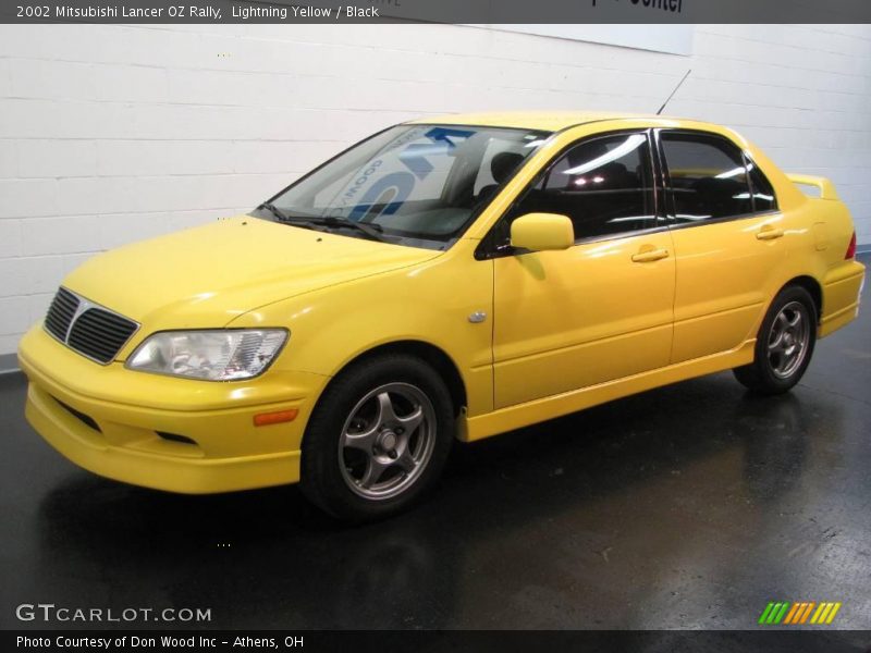 Lightning Yellow / Black 2002 Mitsubishi Lancer OZ Rally