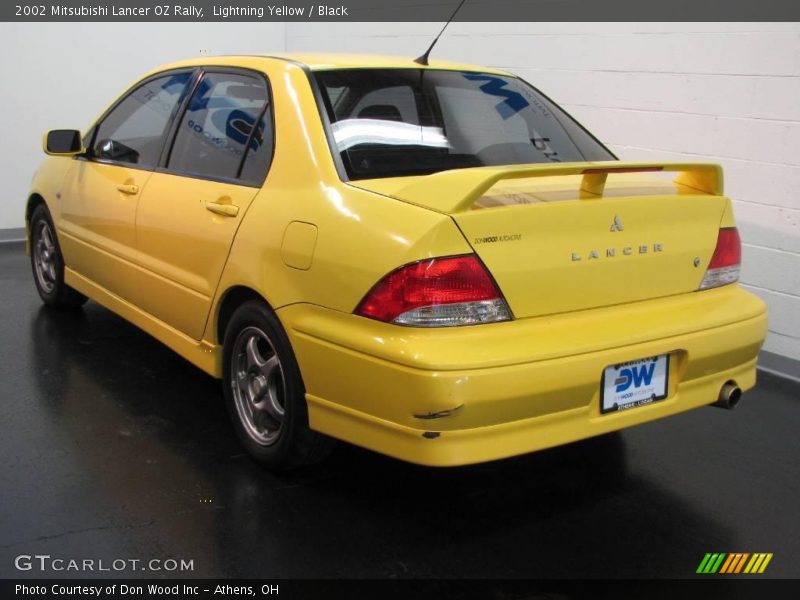 Lightning Yellow / Black 2002 Mitsubishi Lancer OZ Rally