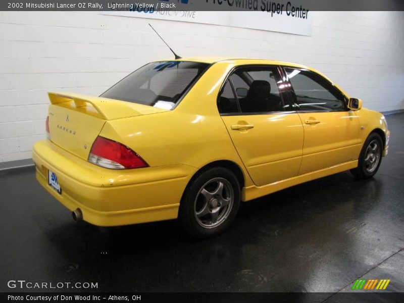 Lightning Yellow / Black 2002 Mitsubishi Lancer OZ Rally