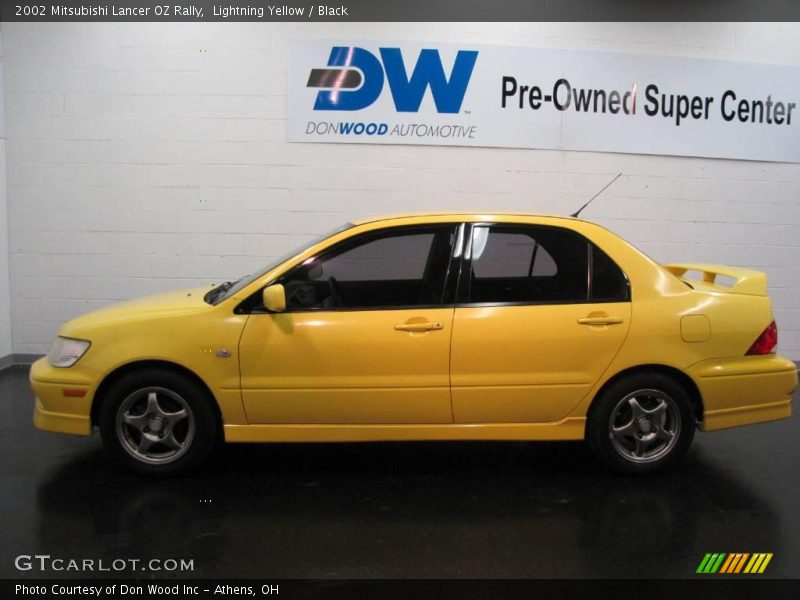 Lightning Yellow / Black 2002 Mitsubishi Lancer OZ Rally