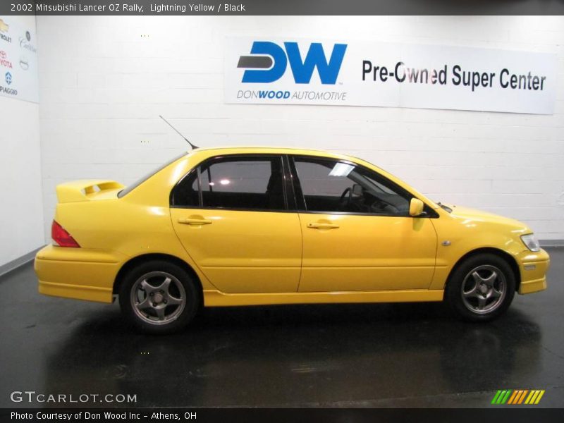 Lightning Yellow / Black 2002 Mitsubishi Lancer OZ Rally