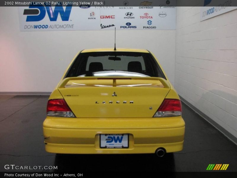 Lightning Yellow / Black 2002 Mitsubishi Lancer OZ Rally